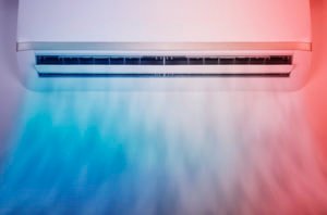 Air conditioner with blue and red color tint